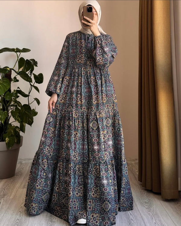 Model wearing a printed Rahath gown