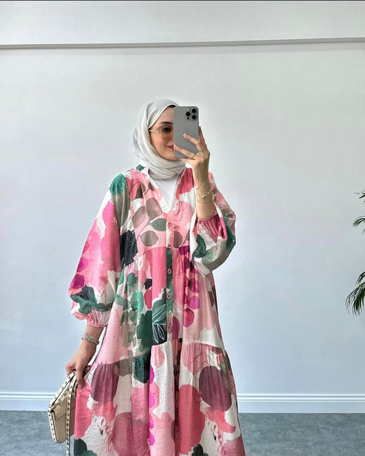 Customer wearing the Rozy floral gown